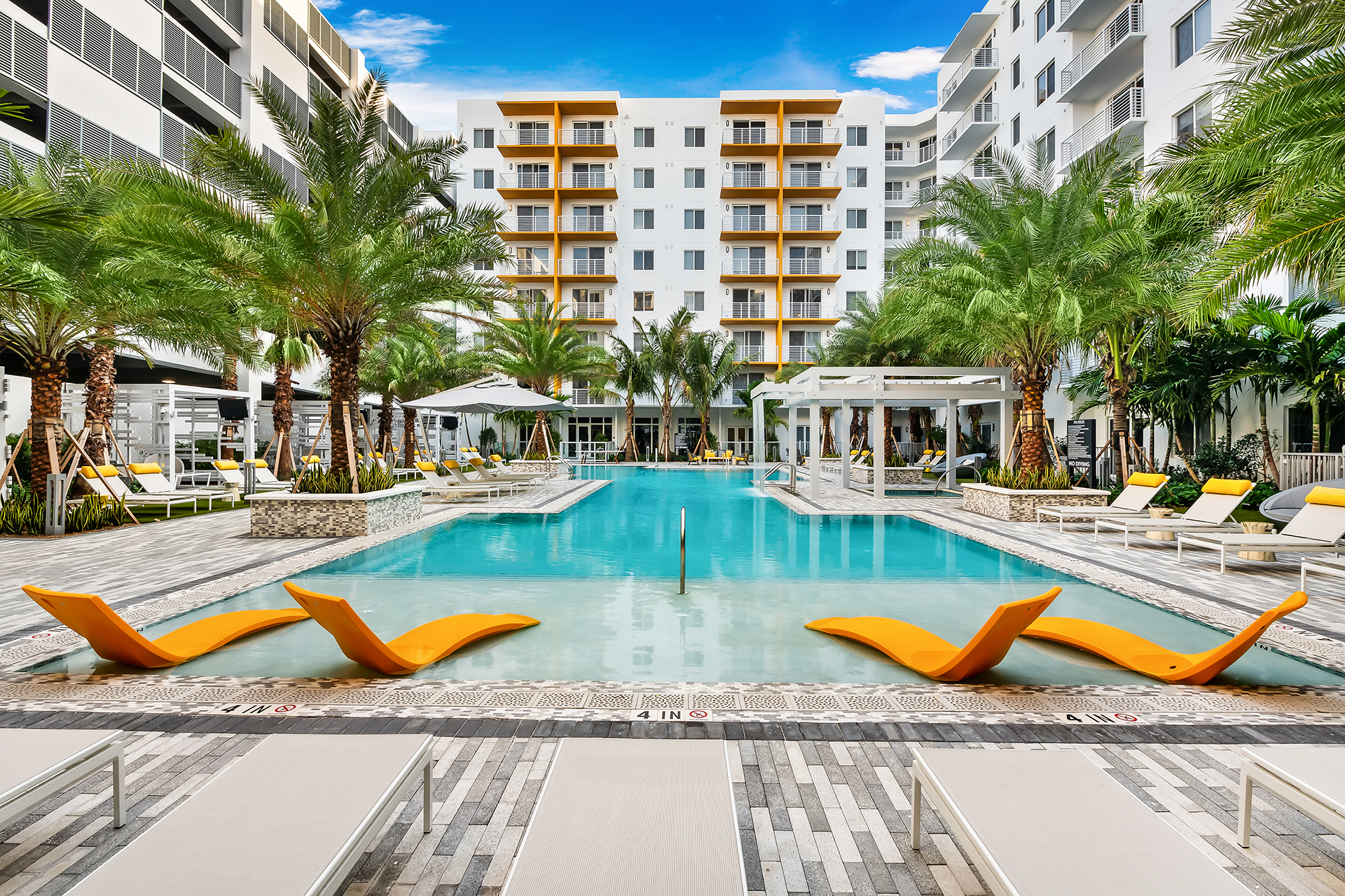 Aura Boca Apartments pool area